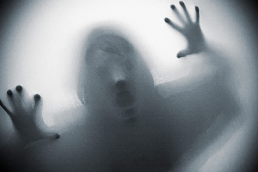 meaning of ghost haunting