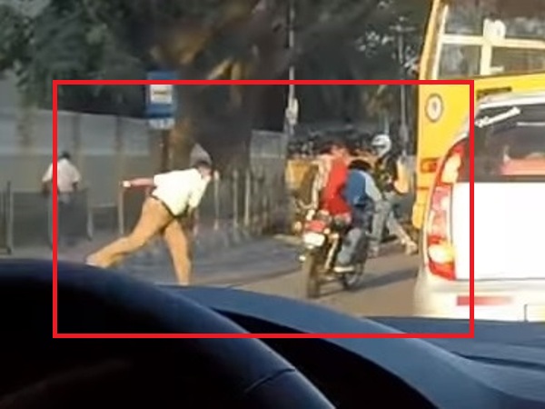 Traffic Cop Throwing Shoe At Two Bikers Without Helmet Caught On Camera, Suspended - RVCJ Media