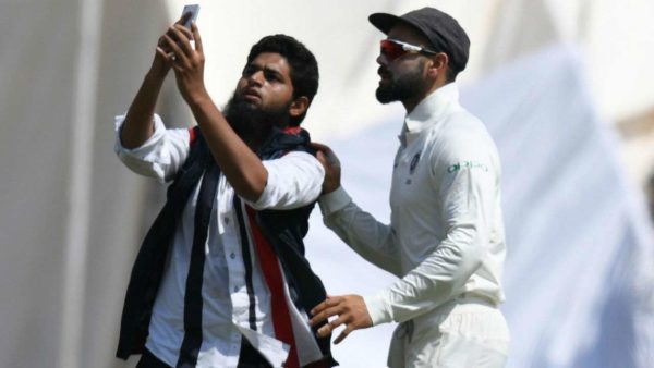 One More Fan Breaches Security To Hug Virat Kohli & Click Selfie With Him - RVCJ Media