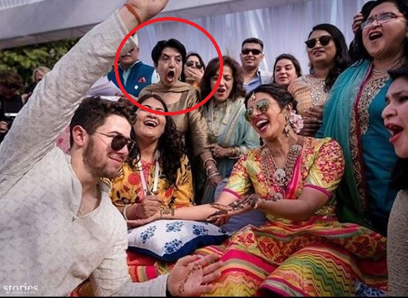 Twitterati Is Amused With This Aunti In Nickyanka's Mehendi Picture. Their Reactions Are Hilarious - RVCJ Media