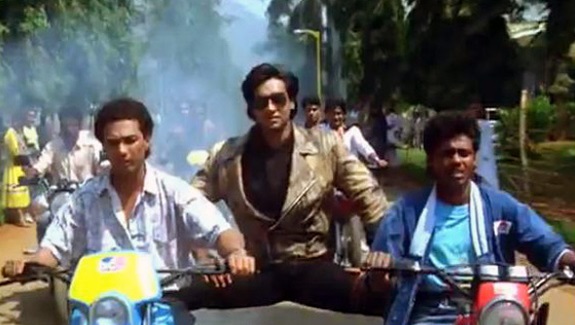 Ajay Devgn & Riteish Had A Funny Banter Over Video Of A Parrot Doing Stunt On Two Cars - RVCJ Media