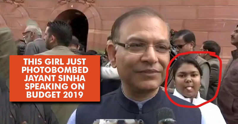 Girl Hilariously Photobombs Jayant Sinha Speaking On Budget 2019, Netizens Can't Stop Laughing RVCJ Media