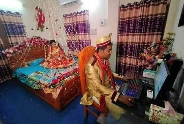 Viral Photo Of Dulha Being Busy On Computer On Suhaagraat & Bride Waiting Sparks Meme Fest - RVCJ Media