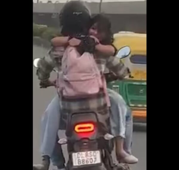 Delhi Traffic Police Got Slammed For Its Response To The Couple’s PDA On A Moving Bike - RVCJ Media