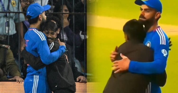 Fan Breaches Security To Meet Virat Kohli, Hugs Him &Amp; Touches His Feet Before Getting Arrested 1 Fan Breaches Security To Meet Virat Kohli, Hugs Him & Touches His Feet Before Getting Arrested