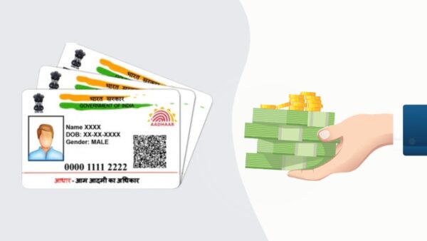 Aadhaar Card Pdf Password: How To Download E-Aadhaar In 2026 2 Aadhaar card placed next to a mobile phone showing the myAadhaar portal