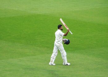 Virat Kohli raises his bat after a Test century at Trent Bridge in 2018